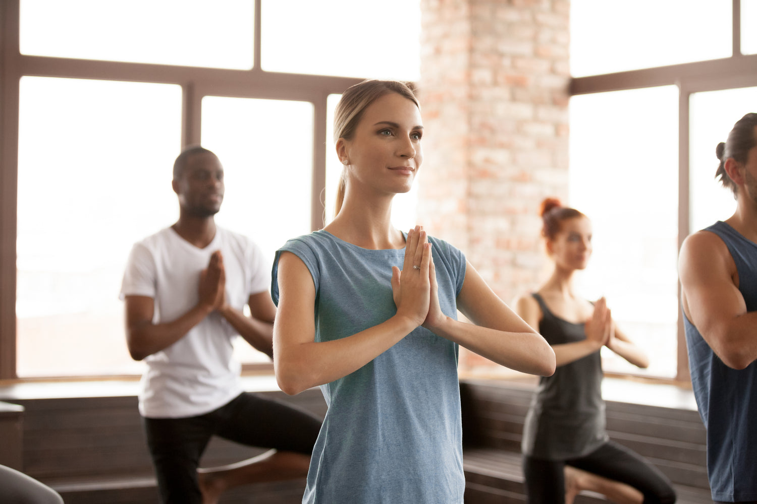 Woman doing yoga in studio